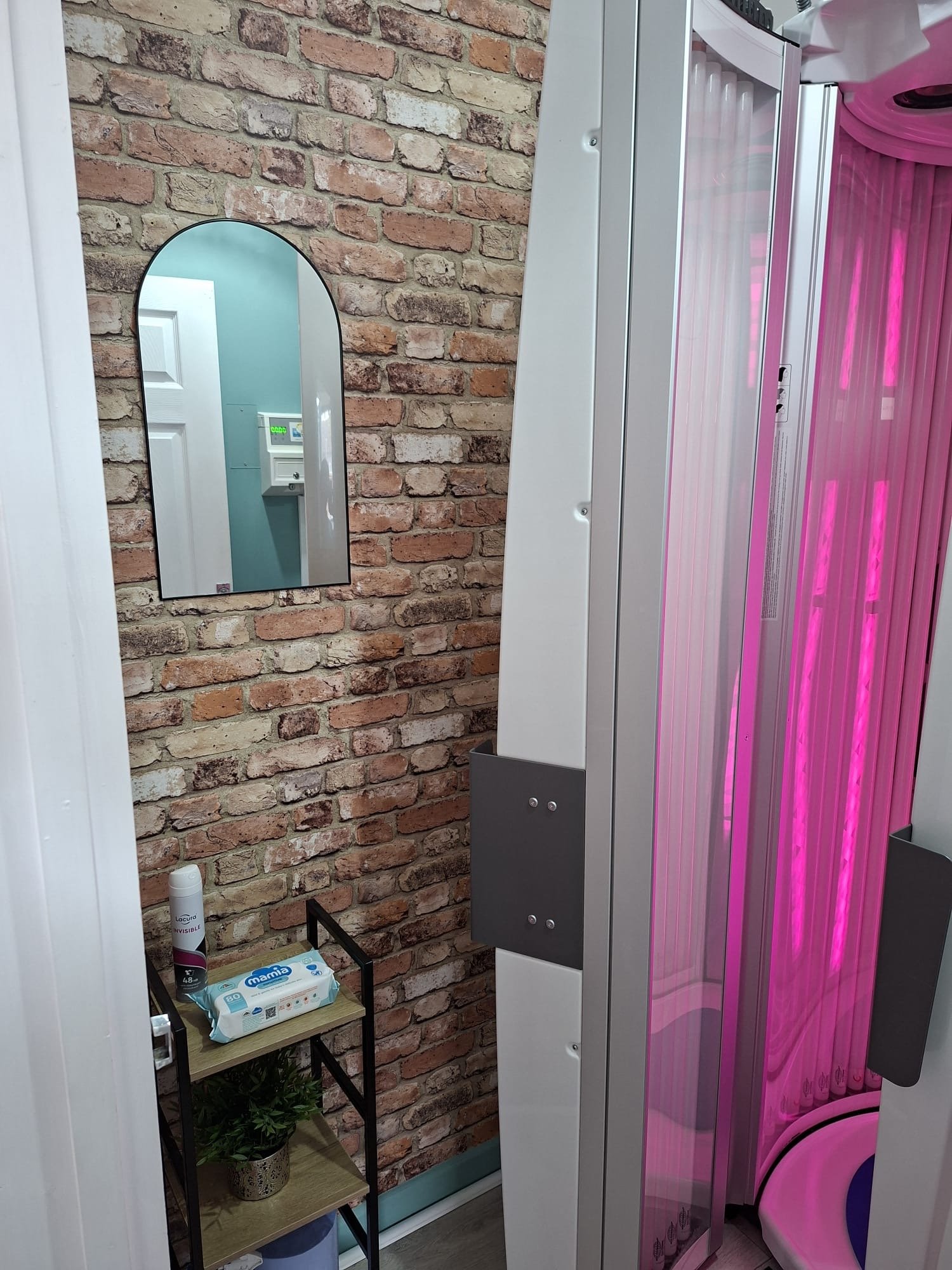 Stand up tanning sunbed at Sapphire Beauty & Tanning Salon